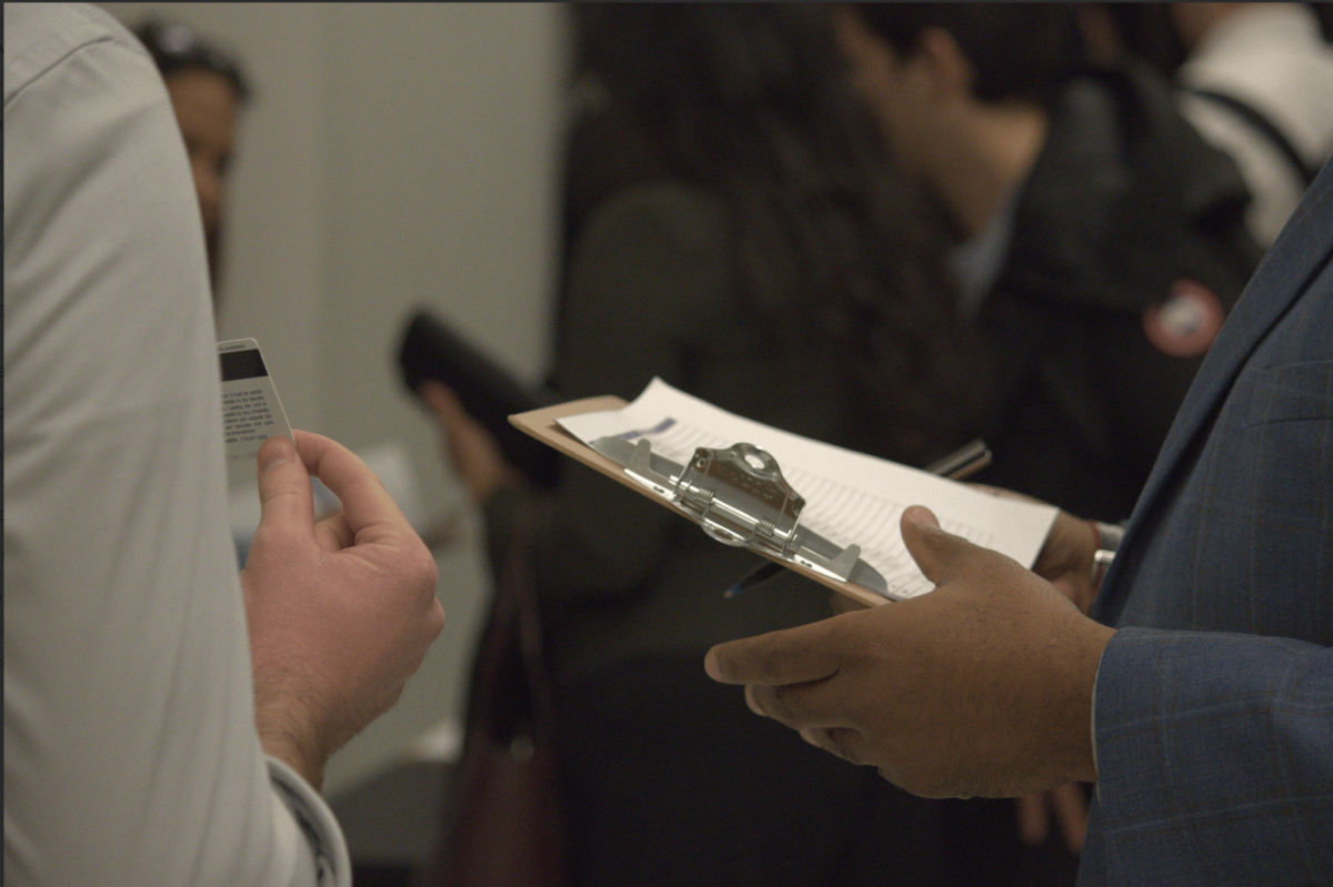 Students had to show their Fordham IDs to get into the discussion. (Andrew Massie/The Fordham Ram)